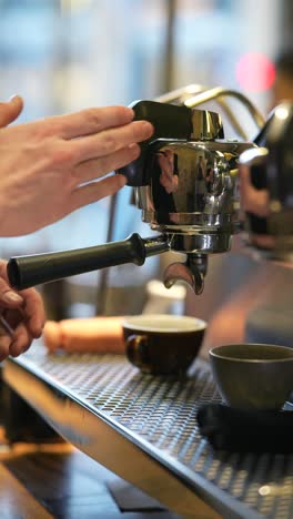 barista making coffee