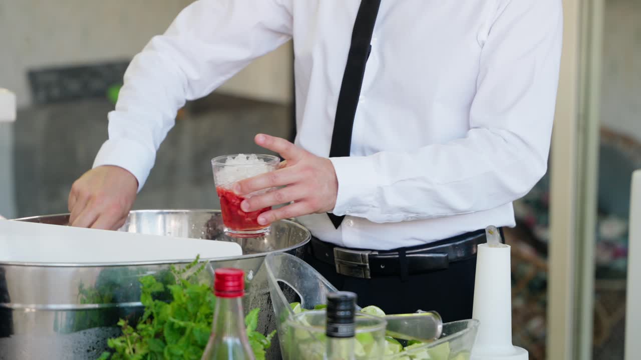 Bartender Preparing a Cocktail at a Catering Event