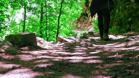 Ground-level-shot-of-man-passing-by-during-a-trek-