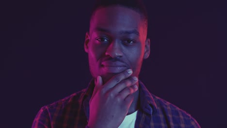 man in a plaid shirt, studio portrait