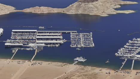 lake mead nevada aerial v6 zoomed birds eye view flyover the terrain basin capturing floating marina, blue waters, sandy shore and views of boulder islands - shot with mavic 3 pro cine - apr 16th 2024