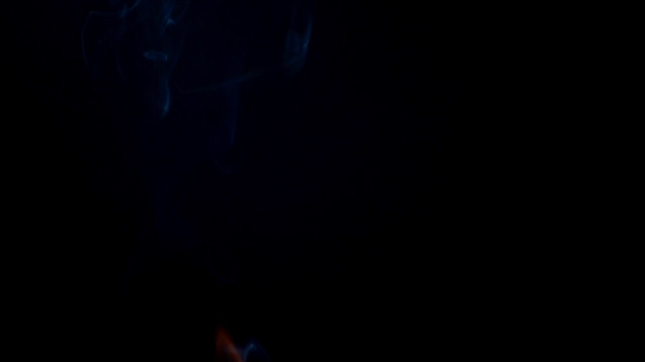 Smoke on a black background. Slow motion