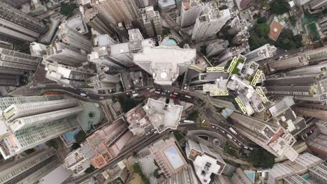 홍콩 시내 풍경의 조류 시각 (bird eyes view of hong kong cityscape from the drone) - 홍콩 시의 조종기로부터 90도 상공 풍경, 카메라가 아래에서 위로 이동한다.