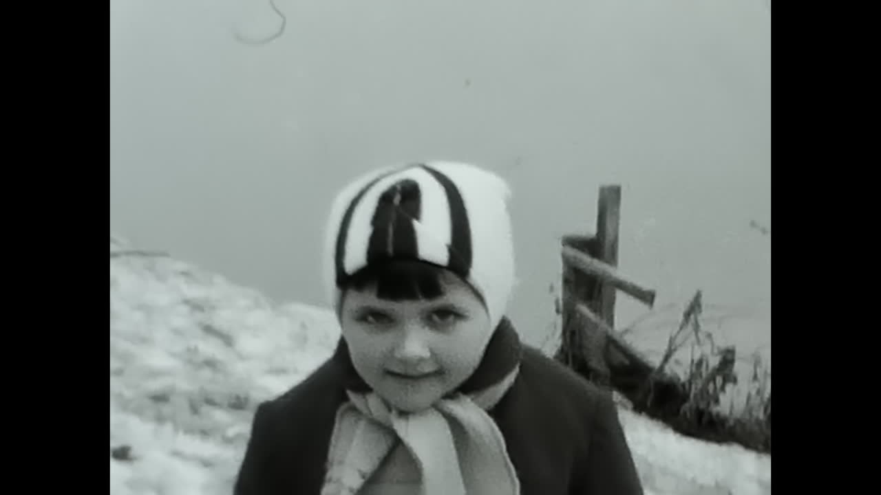 A Black and White Video of a Bridge Spanning Over Water Spring flood. CIRCA USSR 1970: A captivating black and white video showcasing a bridge majestically stretching over calm waters. Spring flood
