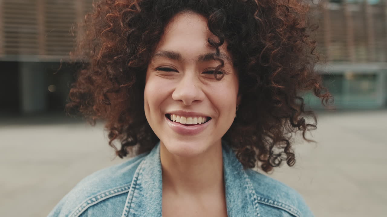 Portrait of a woman with curly hair