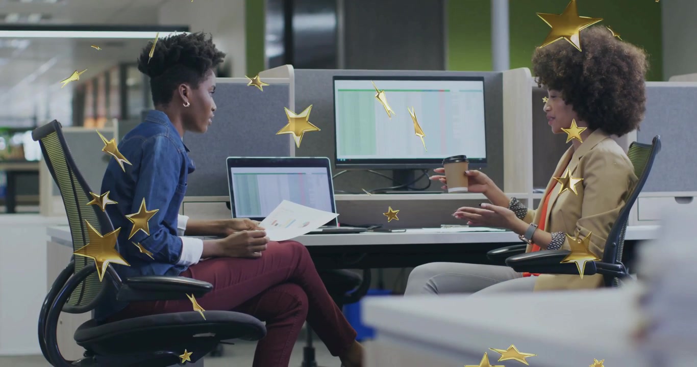 Coworkers offering coffee, reviewing charts for business with drifting gold stars boosting teamwork