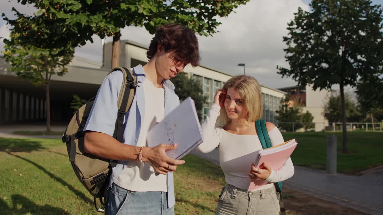 Two students studying together on campus