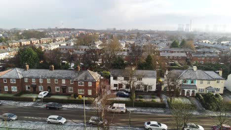 aerial view frosty white winter residential town neighbourhood rooftops dolly slow right
