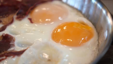 fried eggs in pan