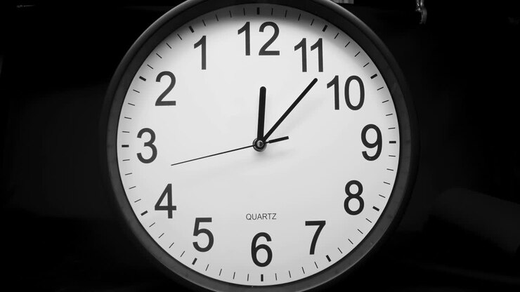 A look of the wall clock on a counter clockwise movement
