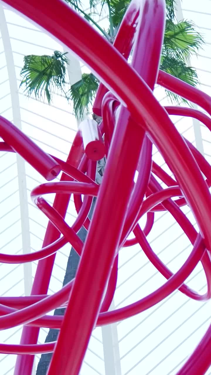 Abstract Red Sculpture in Urban Setting