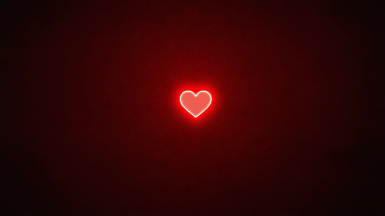 Simbolo di cuore al neon rosso che pulsa illuminandosi su uno sfondo scuro con alone sfumato