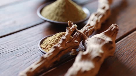 natural herbal spices on wooden table