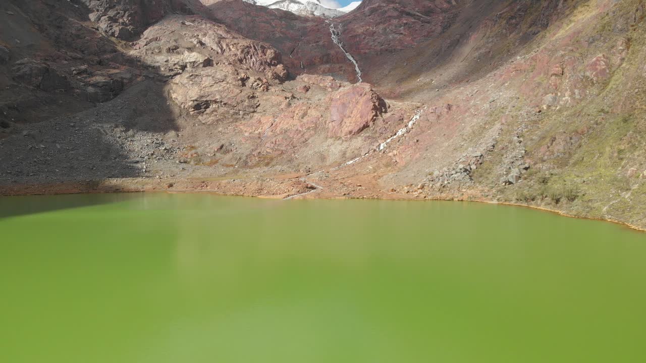 Flying over shallap lake, green lake peruvian andes, save the water