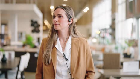 confident associate strides forward, smiling while scanning showroom floor