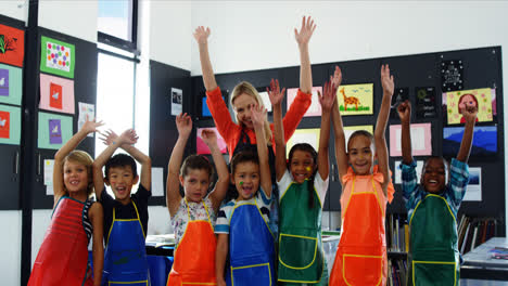 Portrait-of-teacher-and-schoolkids-having-fun