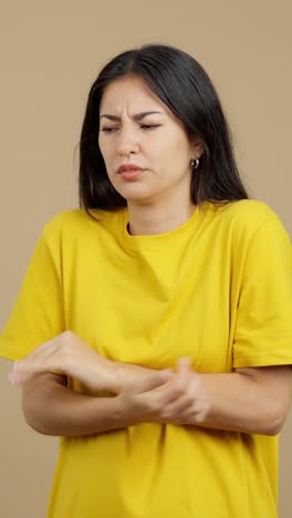woman reacting to bad smell, cold, or discomfort