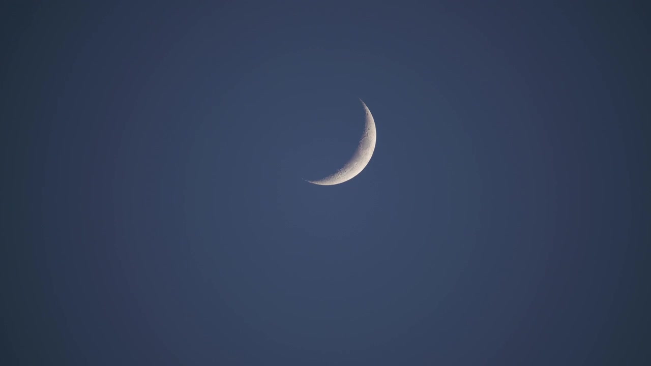 Crescent Moon Setting in the Evening Sky