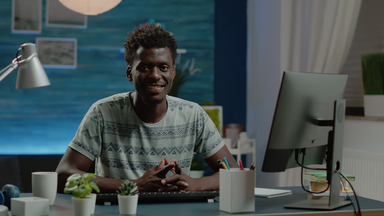 Man working from home using computer and keyboard