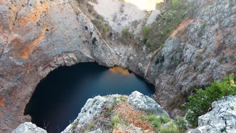 a picturesque location of the biggest limestone crater and sinkhole in europe