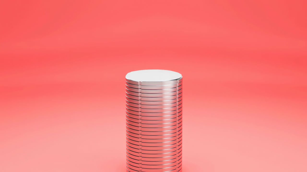 Tall stack of polished chrome coin-like cylinders stands centered within smooth coral pink gradient backdrop, creating reflective metallic contrast, soft highlights, clean symmetry, and modern display