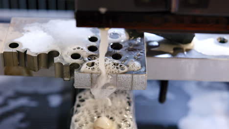 precision metal machining with coolant in an industrial setting