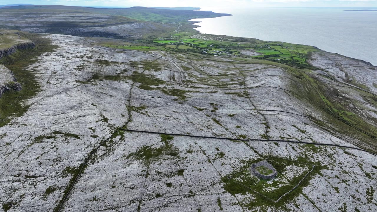 Ireland Epic Locations drone dramatic landscape of The Burren Clare coastal drive on The Wild Atlantic Way Ireland in dramatic light