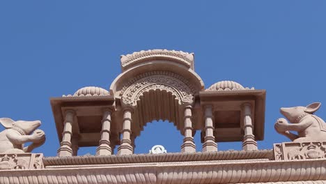 artistic temple entrance gate with bright sky at morning from flat angle video is taken at ratanada jodhpur rajasthan india on nov 14 2022