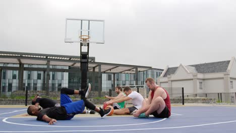 basketball players exercising in basketball court 4k