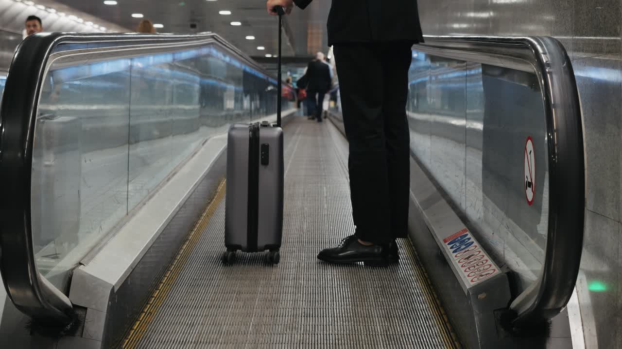 Tourist man with suitcase baggage in spain, A traveler with luggage suit jacket on business street go to a hotel, business office, airport terminal, enjoying the vibrant atmosphere