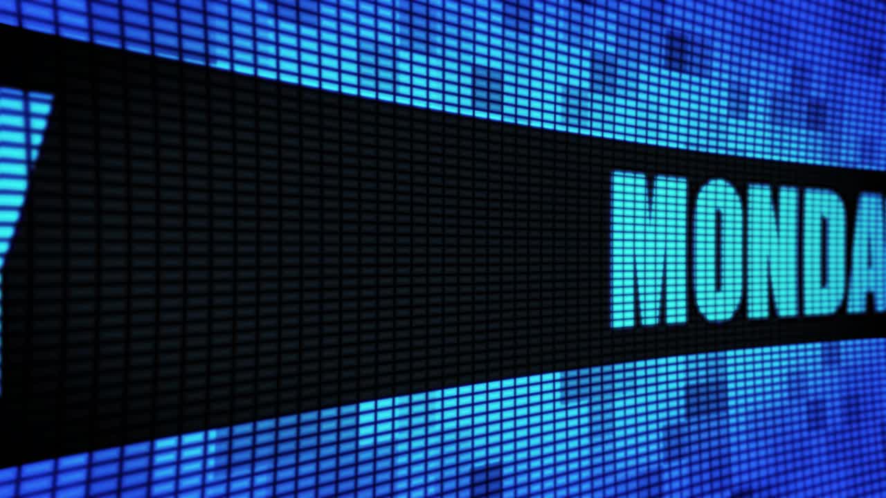 Monday displayed on a digital LED screen