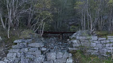 Approaching-ancient-decommissioned-railway-Bergensbanen-at-Rodberg,-Norway