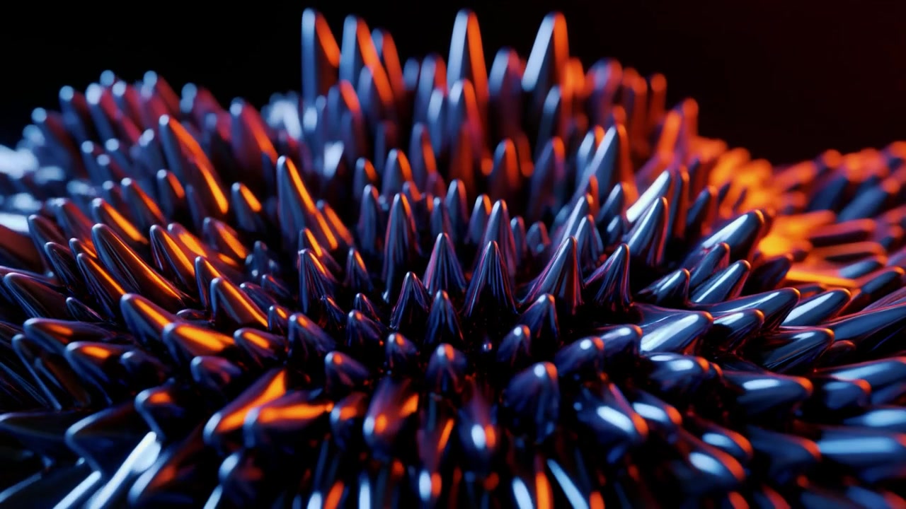 Abstract Ferrofluid Spikes Moving in Blue and Orange Lighting