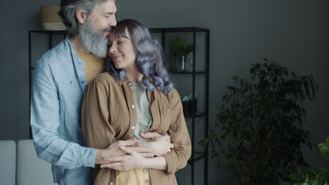 affectionate couple in living room