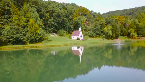 aerial over a romantic and beautiful small church in the american wilderness west virginia 5