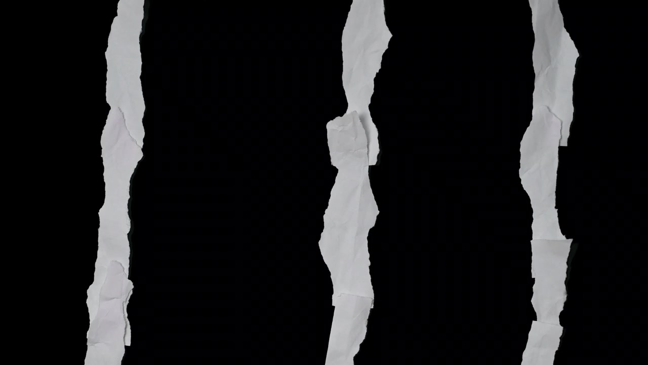 Three Vertical Strips of Torn White Paper on Black Background