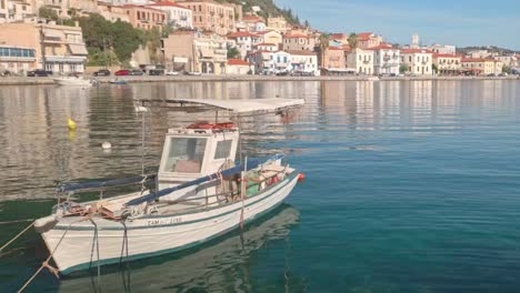fishing boat in a picturesque greek harbor