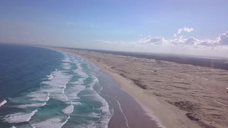 flight above a exotic massive beach-sand dunes. central coat