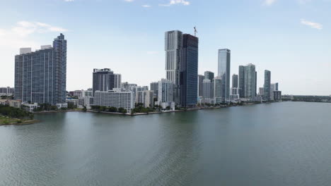 aerial view rising toward high-rise construction site in edgewater, miami, usa