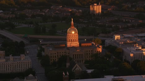 aerial shot capitol building in downtown atlanta at sunset.