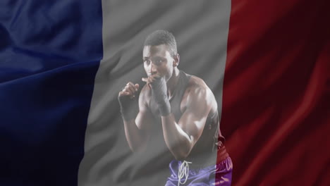 animation of flag of france over african american male boxer