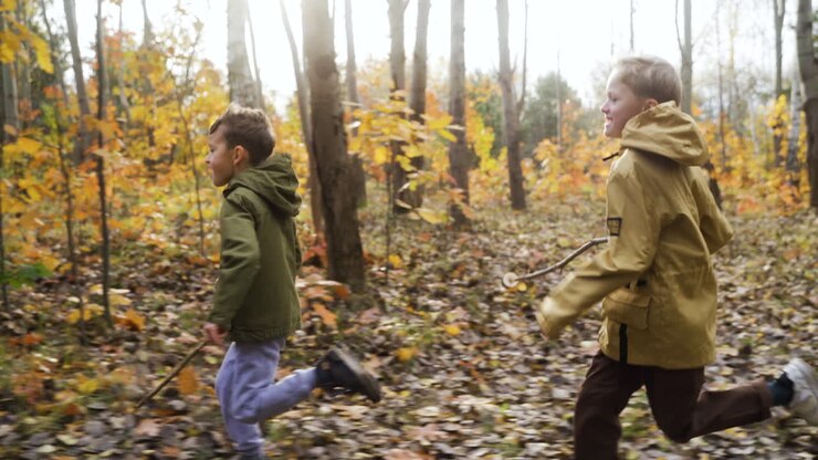 Kids running at the forest