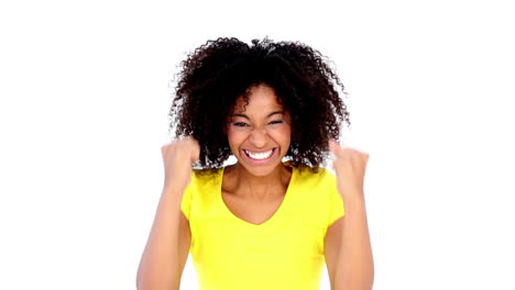 Pretty-girl-in-yellow-tshirt-cheering-at-camera