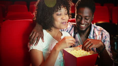 cute couple watching a movie