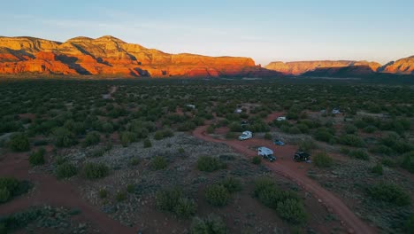 High-aerial-view-of-a-dispersed-campground-with-truck-camper-arriving-in-Sedona