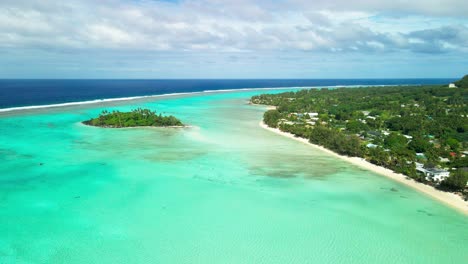 slow mo cinematic aerial landscapes over rarotonga in the cook islands with crystal clear shallow reef below