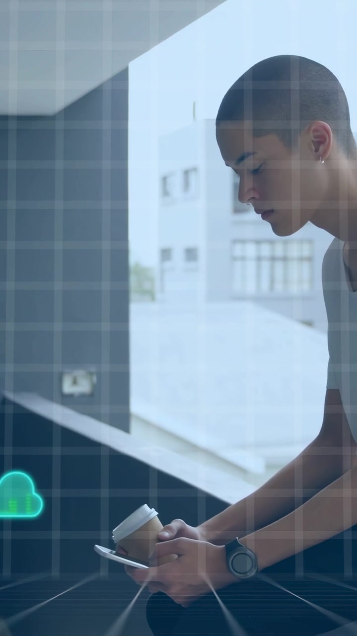 Vertical video: Man leaning on ledge tapping phone checking cloud data with neon clouds crossing