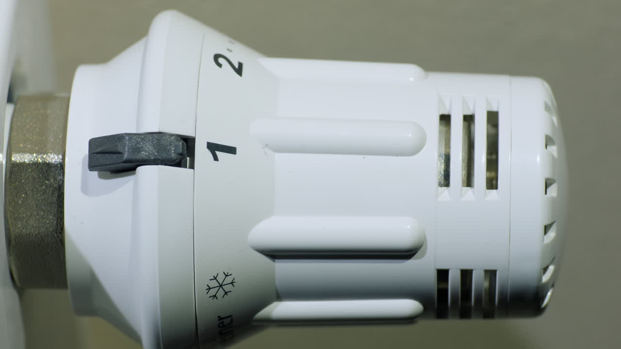 ajustar la temperatura en el ahorro de energía del radiador de calefacción