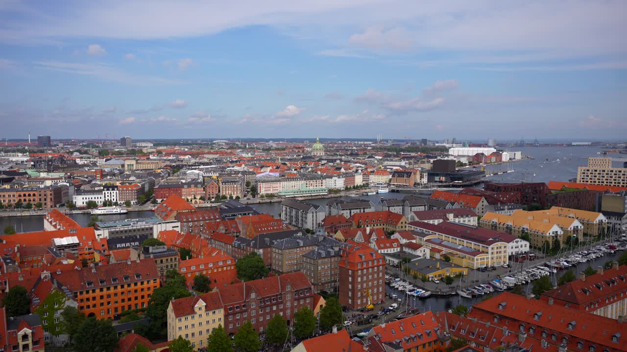 Stunning view of Copenhagen city with red roofs and palaces towers, Denmark