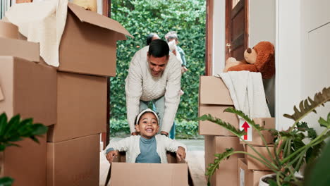Kid,-playing-and-father-at-new-house-with-box